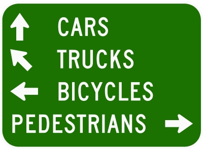 CARS TRUCKS BICYCLES PEDESTRIANS SIGN